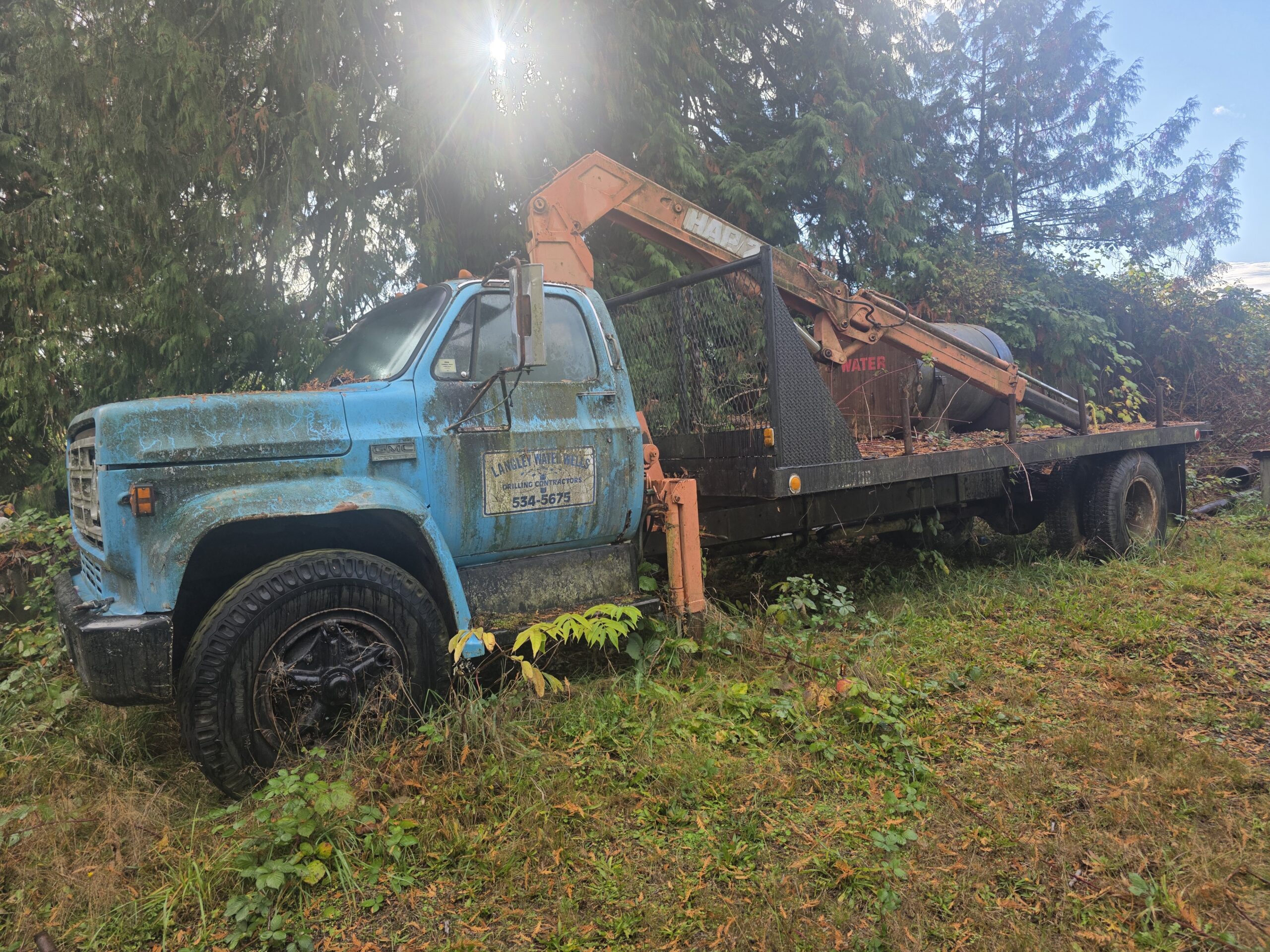 Scrap 1970s GMC Chevy flatbed truck crane removal