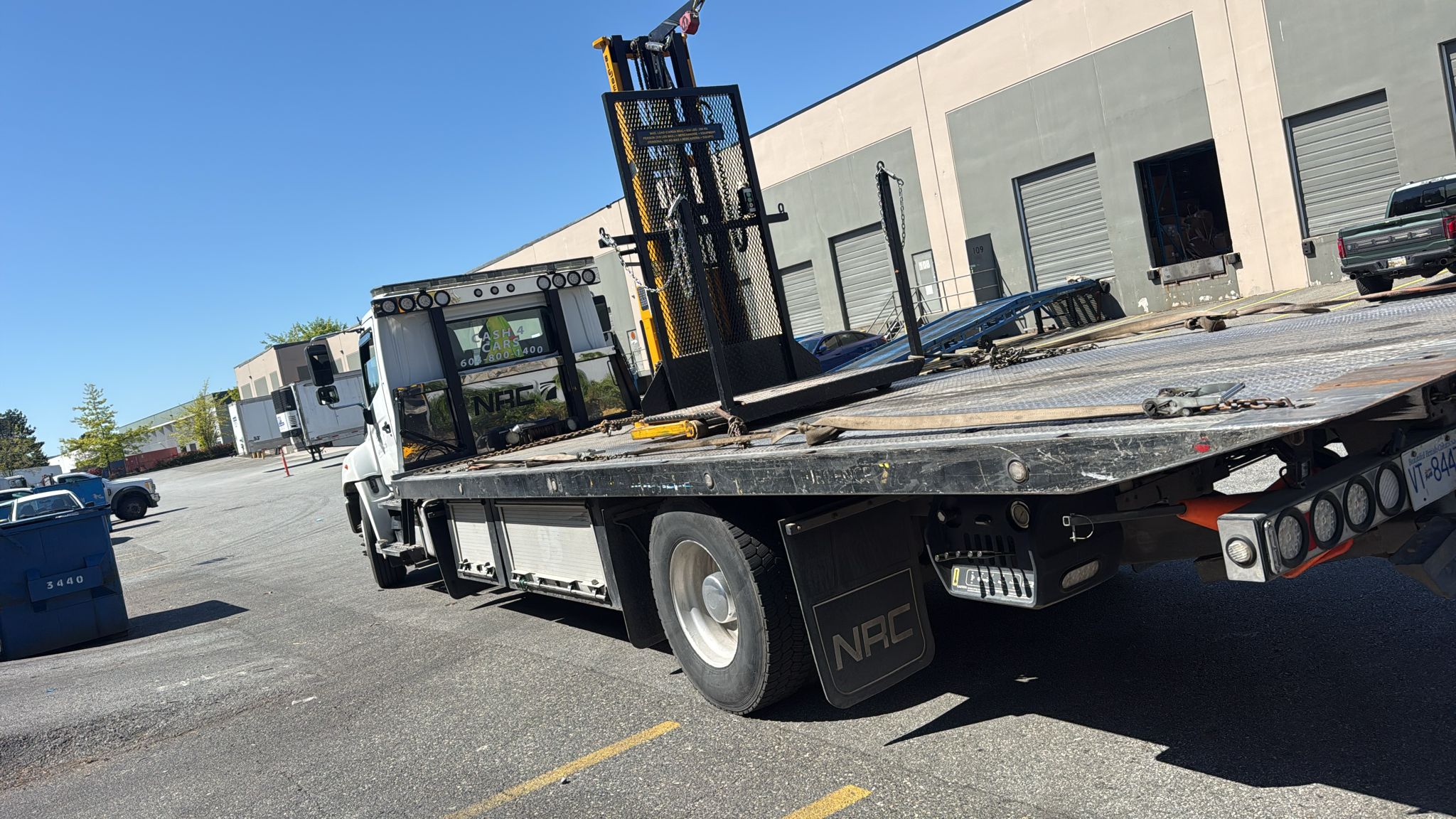 Scrap forklift mast assembly flatbed removal
